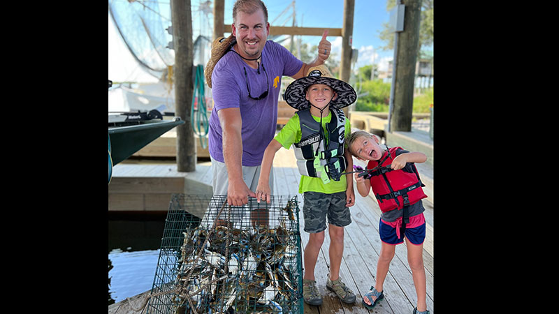 A full basket of crabs caught by the Moore Family on Delacroix Island.