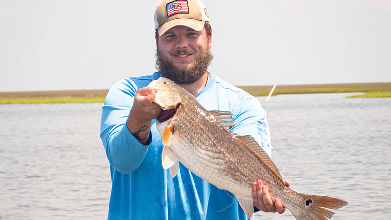 Dakota Johnston got his first redfish on June 10, 2023.
