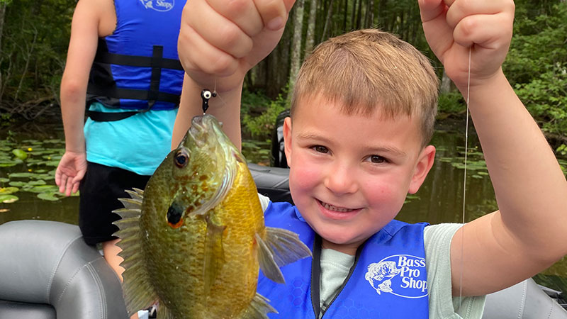 Henry Delatte with a Bayou Corne redear sunfish. He didn't let the summer heat bother him.