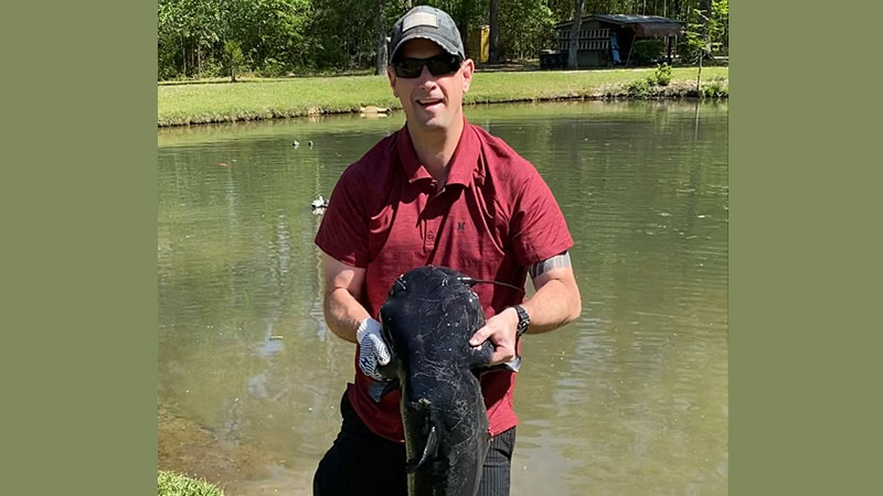Craig Jewell with a big catfish.