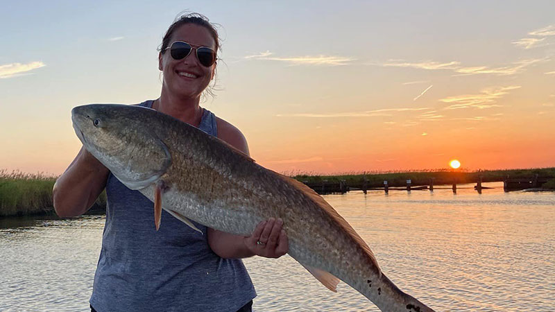 Summer Bagwell with a redfish caught at Pecan Island.