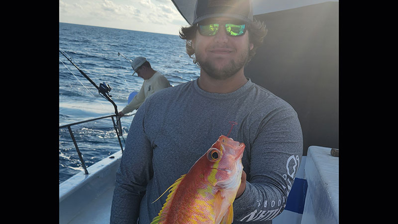 Owen Authement with a longtail bass
