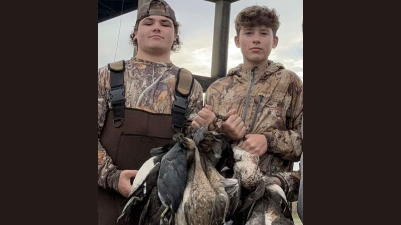 Cayton and Remmie after a hunt at the Wax