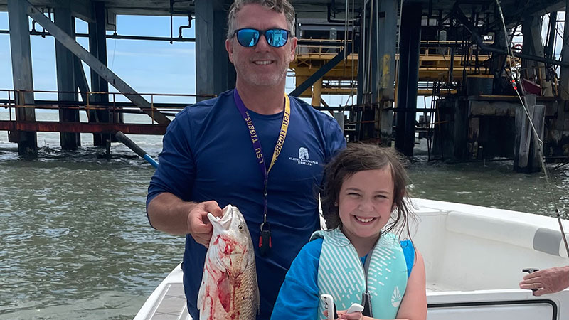 Glenn and Annastyn Fruge with their Lake Pelto fish