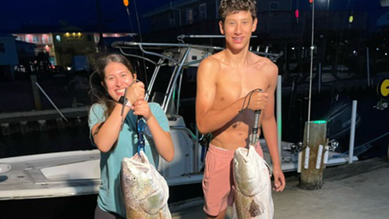 Max and Kaitlyn Williams with bull reds