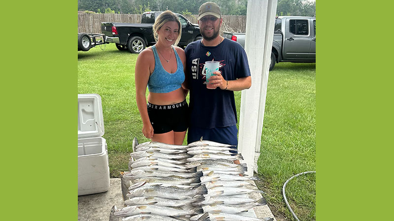 Brandt and Kelsea with Grand Isle specks